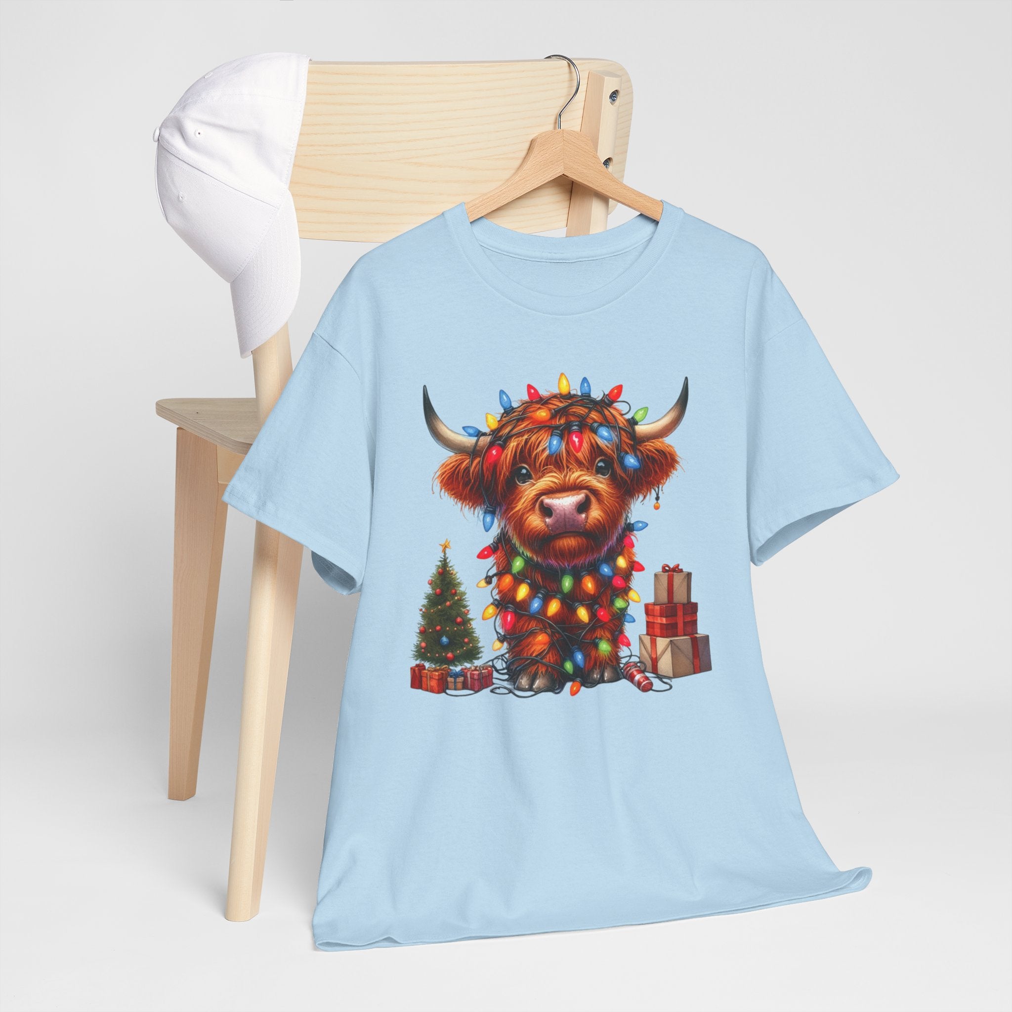 Festive Highland Cow Heavy Cotton Tee - Holiday Cheer